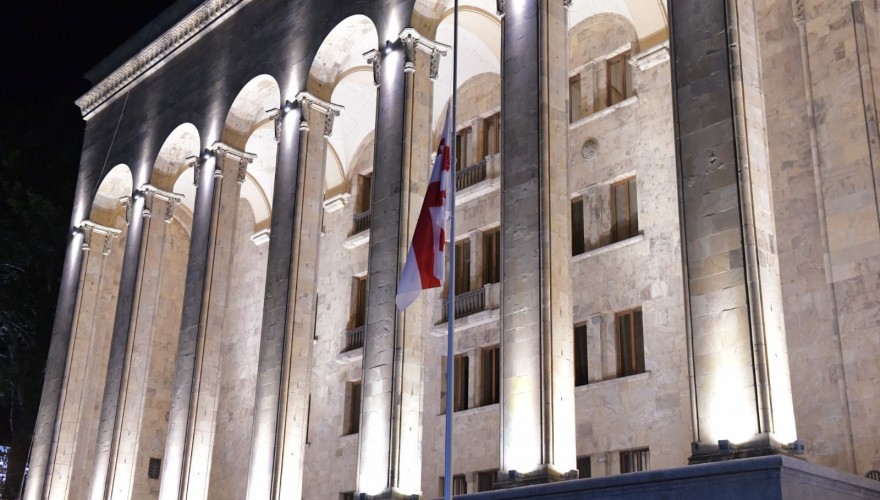 State Flag flying at half-mast at the Parliament Building Marking Soviet Occupation Day