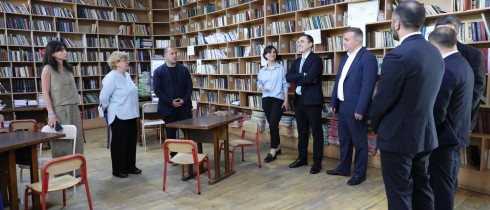 Givi Mikanadze, Lika Shartava and Varlam Liparteliani visiting public schools of the Samgori district